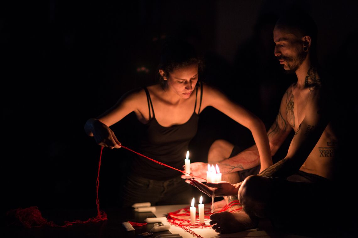 Alperoa, Par de patoz de lanaroja y velas (2012), Live performance in collaboration with Pamela Navarro Ortiz, and video Tattoo for Venice (2012). Image © Monika Sobzcak.