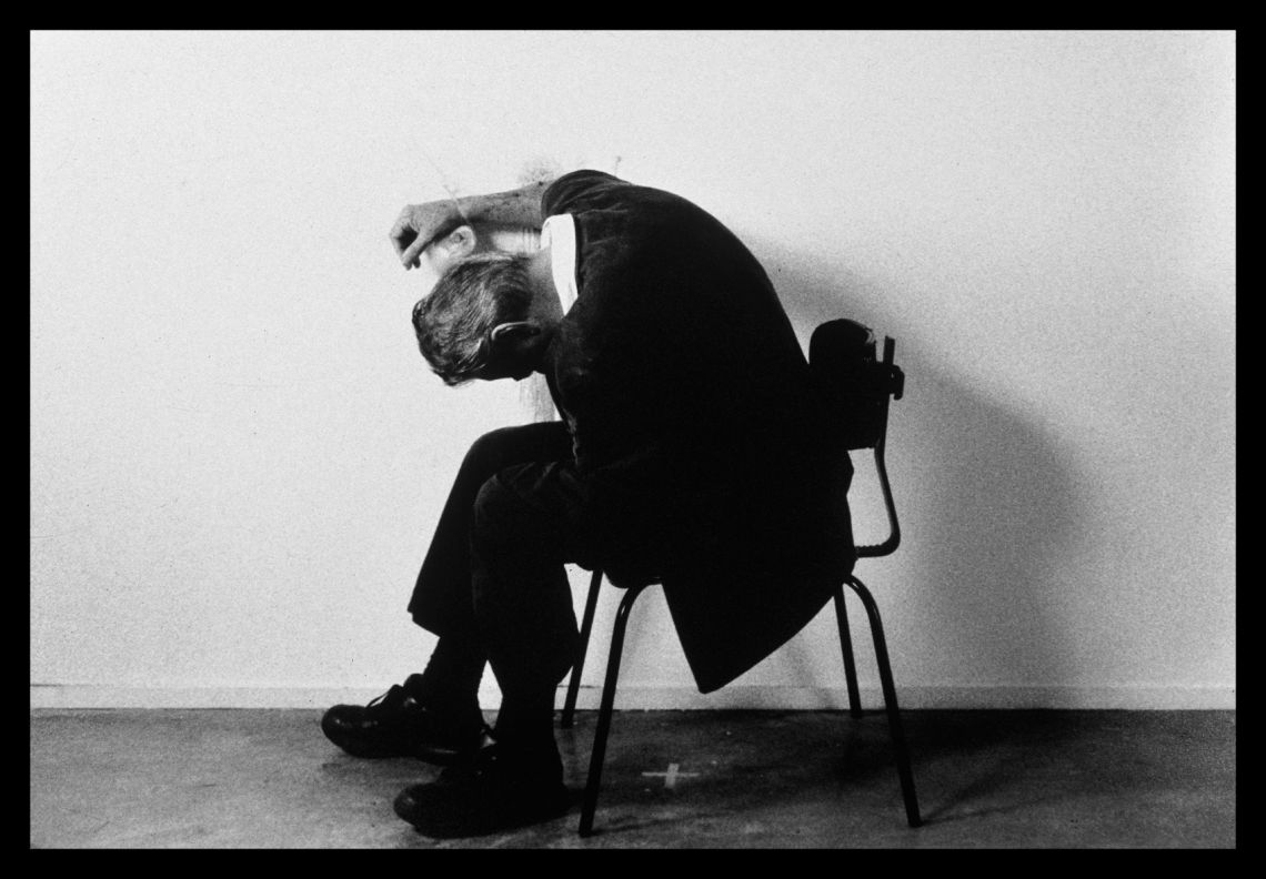 Mike Parr, Malevich (A Political Arm) Performance for as long as possible (2002). Photograph of the performance held at Artspace, Sydney, 3-5 May 2002. Courtesy the artist and Anna Schwartz Gallery.